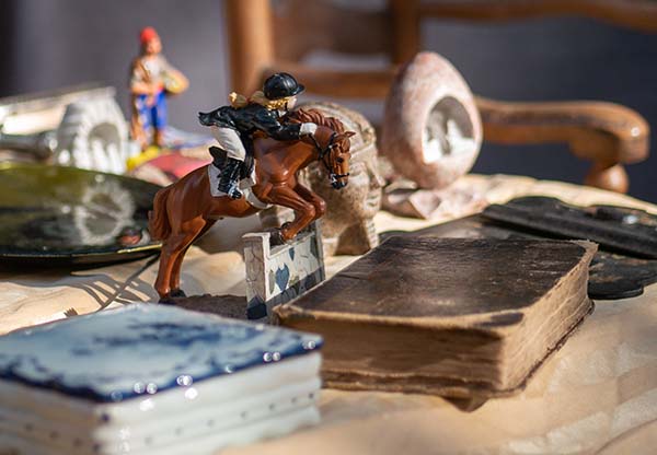 Horse jumping ornament in a charity shop