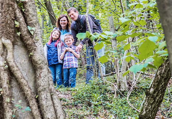 Family Walking in Woods